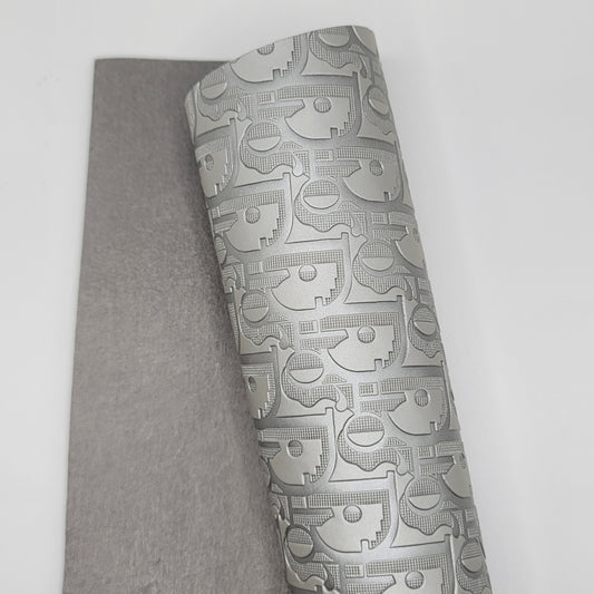 M32b Silver Smooth Embossed D-or Faux Leather