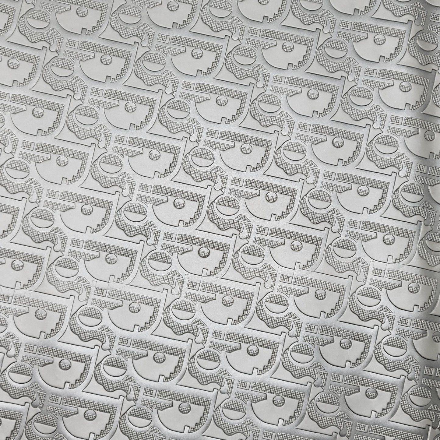 M32b Silver Smooth Embossed D-or Faux Leather